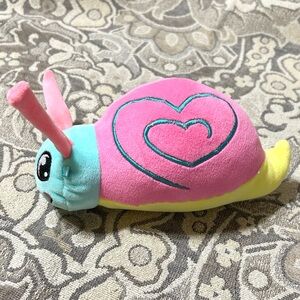 4/$20 Colourful Snail Plush with Embroidered Face & Heart Design on Shell.